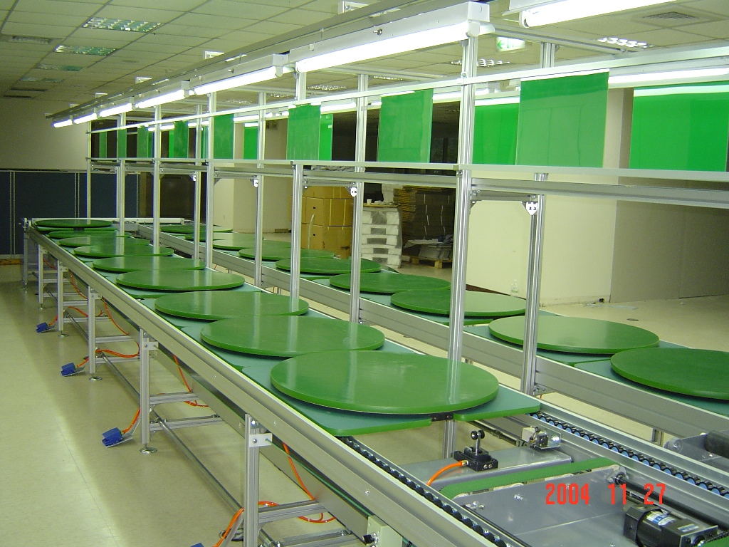 Băng tải xích có bàn xoay chuyển linh kiện