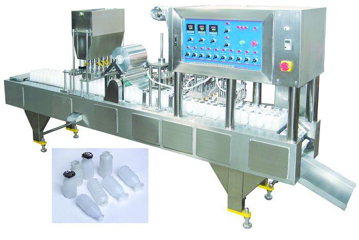 Máy chiết rót và hàn miệng chai sữa